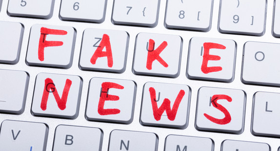 Words Fake News Written On A Keyboard