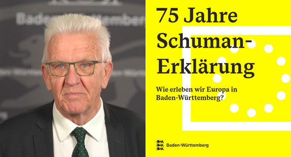 Ministerpräsident Winfried Kretschmann vor einer grauen Pressewand mit Baden-Württemberg-Schriftzug, daneben auf gelbem Hintergrund Text zu 75 Jahre Schuman-Erklärung