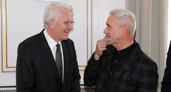 Ministerpräsident Winfried Kretschmann (l.) und Roland Emmerich (r.)