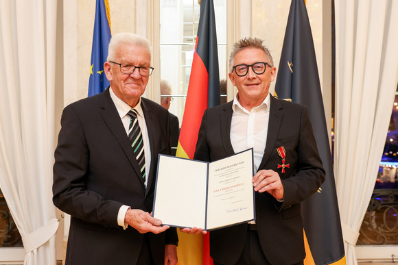 Ministerpräsident Winfried Kretschmann (links) und Christian Skrodzki (rechts)