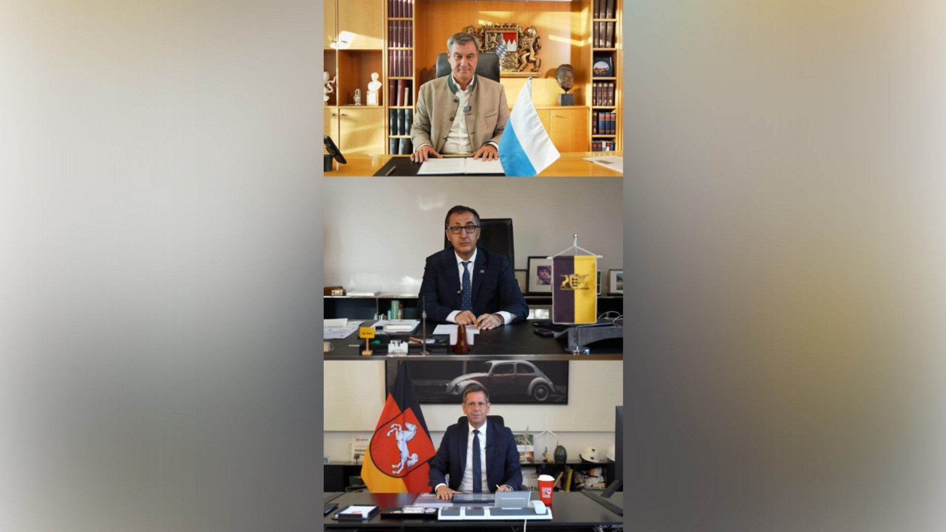 In drei übereinander angeordneten Bildausschnitten sind die Ministerpräsidenten von Bayern, Baden-Württemberg und Niedersachsen zu sehen; sie sitzen jeweils in separaten Büros an einem Schreibtisch mit den jeweiligen Länder-Flaggen.