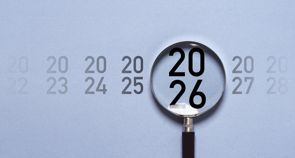 2026 year inside of magnifier glass for focus start new business in new year concept.